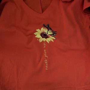 Women’s V-neck Shirt “Never give up” New without tags. Size M